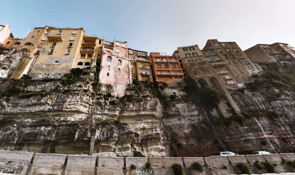 Cliff of Tropea is a natural Landmark in Italy with colorful houses that are perched on the edge of a cliff.